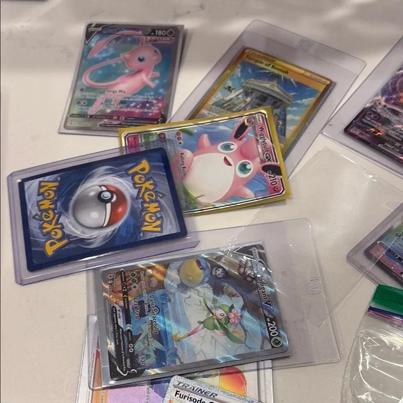 Pokemon Card Collection with Blue and Yellow Design - Picture 2 of 4